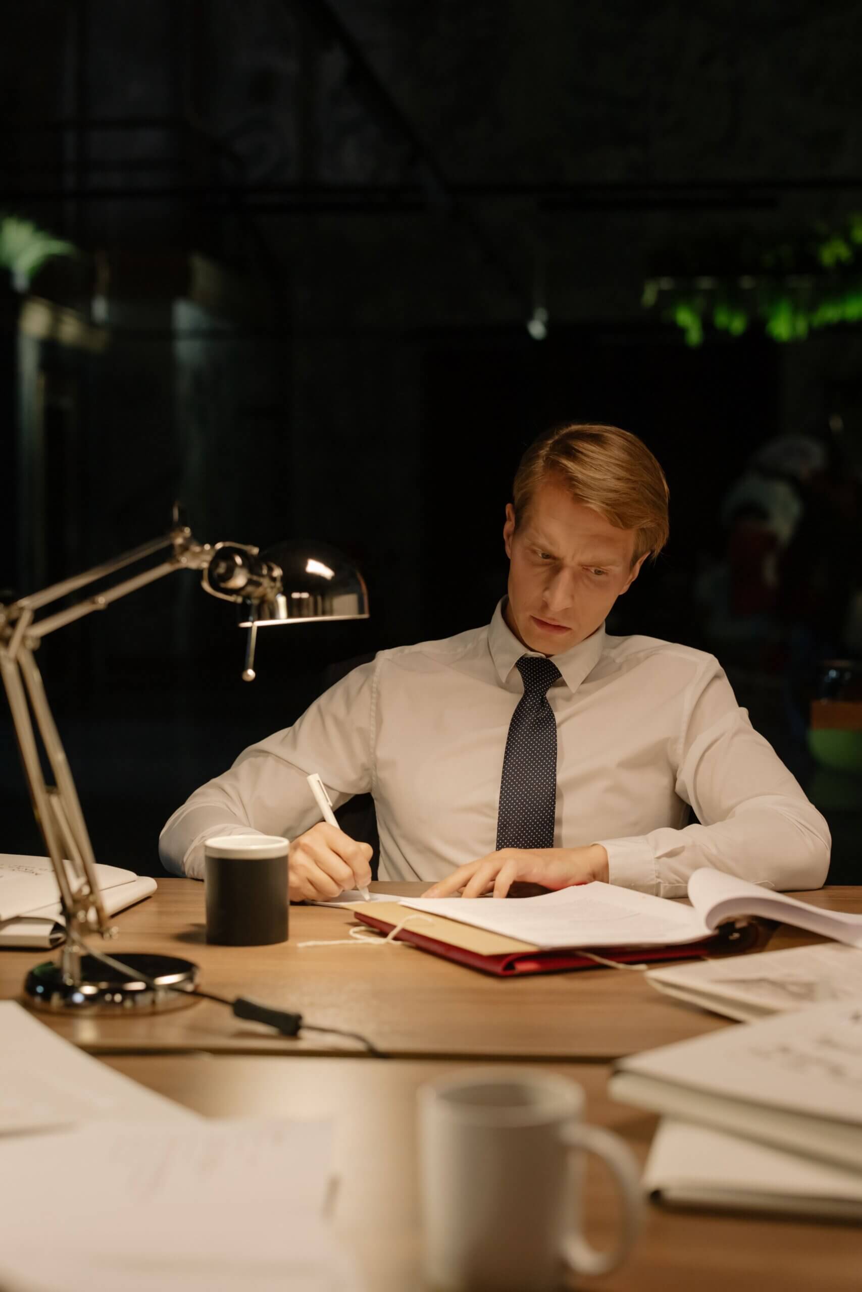 A man working in his office | Counseling for Executives