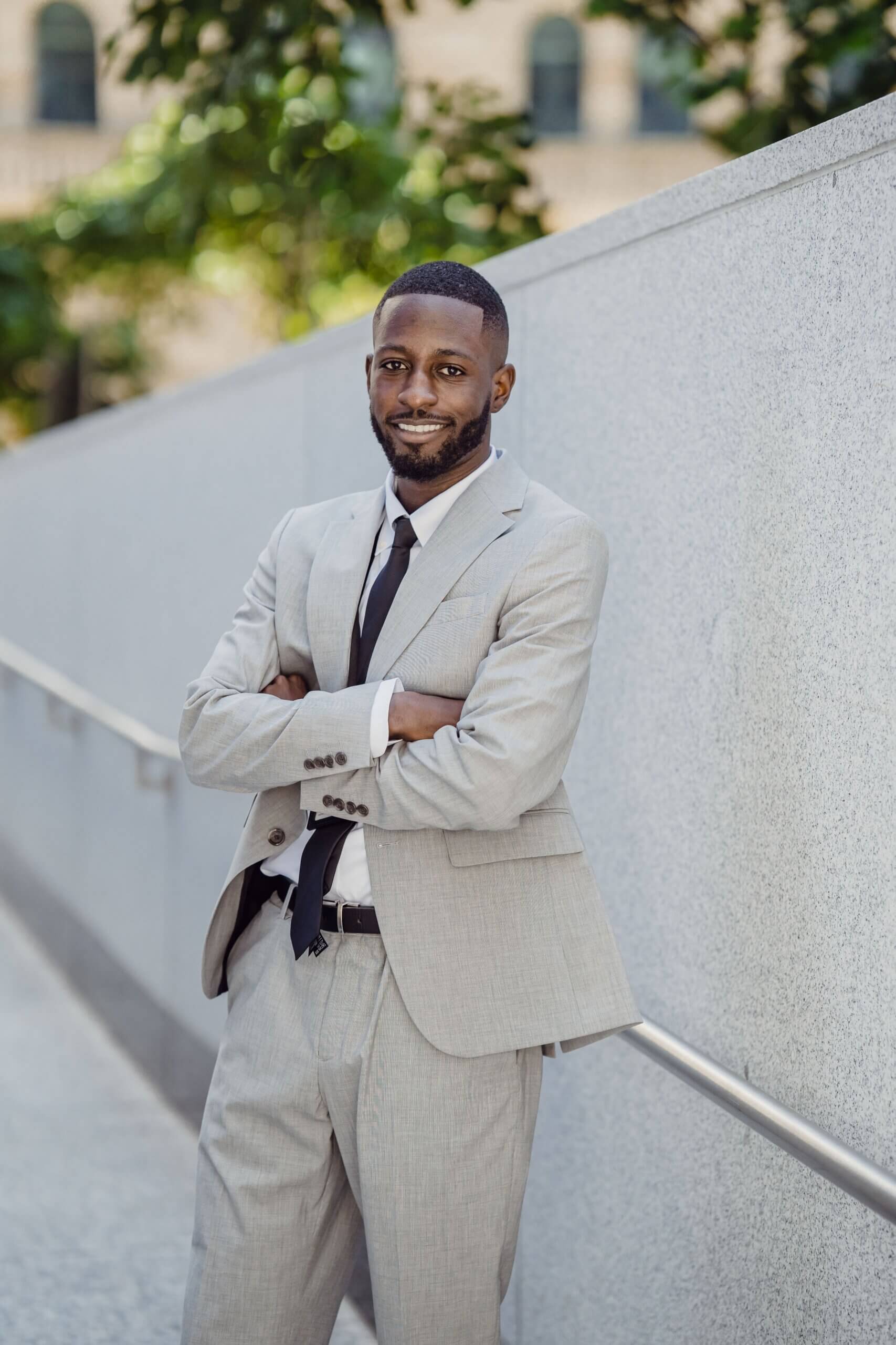 male business owner who is standing outside of his office